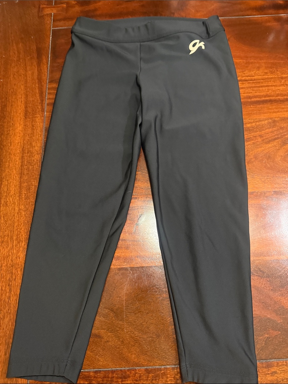 GK ELITE gymnastics Women's Black Athletic Capri Pants with Gold Logo